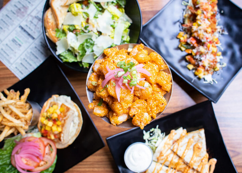 A table filled with deliciousness at Down The Hatch Maui