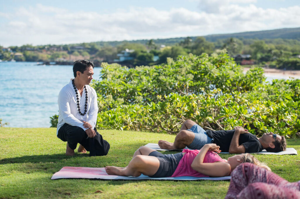 Sam Molitas leads TRE session outdoors on Maui
