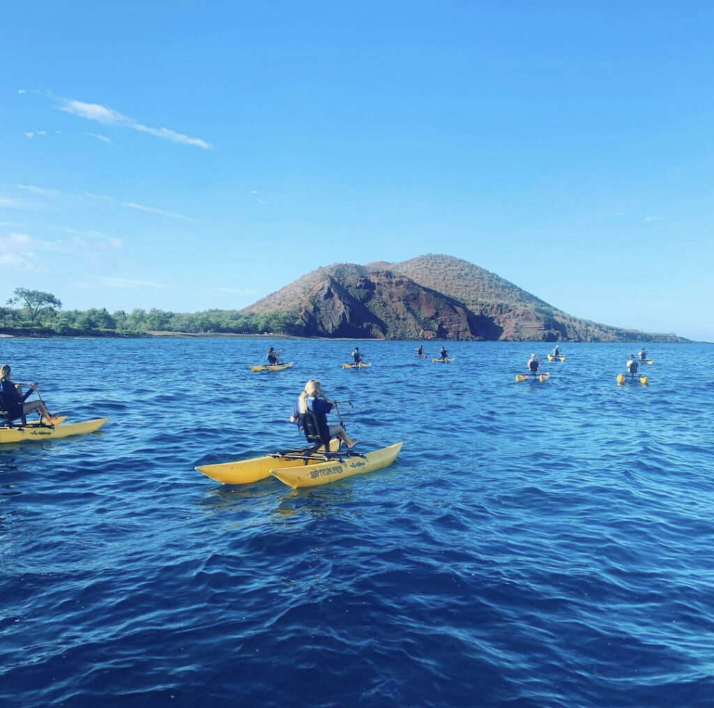 Surf Cycling with Pu‘u Ola‘i in the distance on Maui