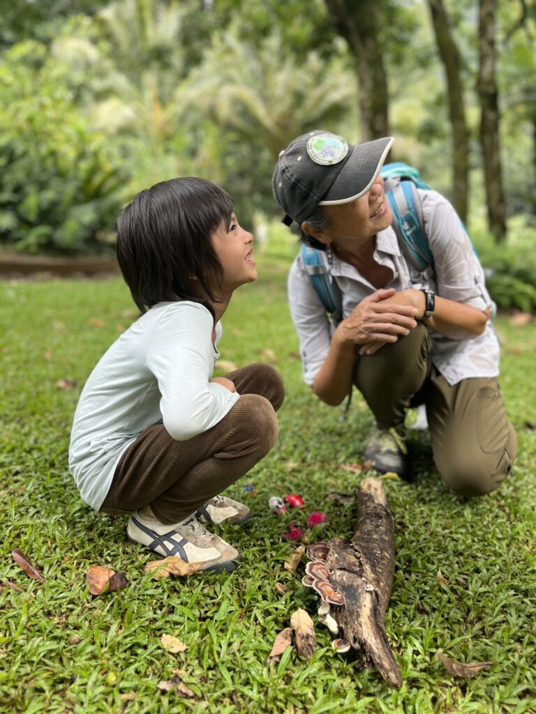 Child with Phyllis Look from Forest Bathing Hawai‘i